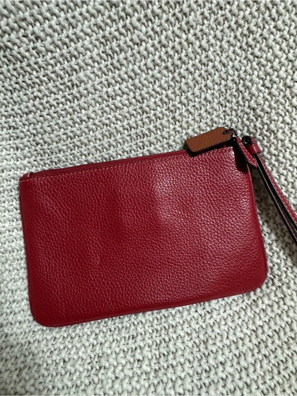 Coach Red Pebbled Leather Wristlet with Floral Emboss